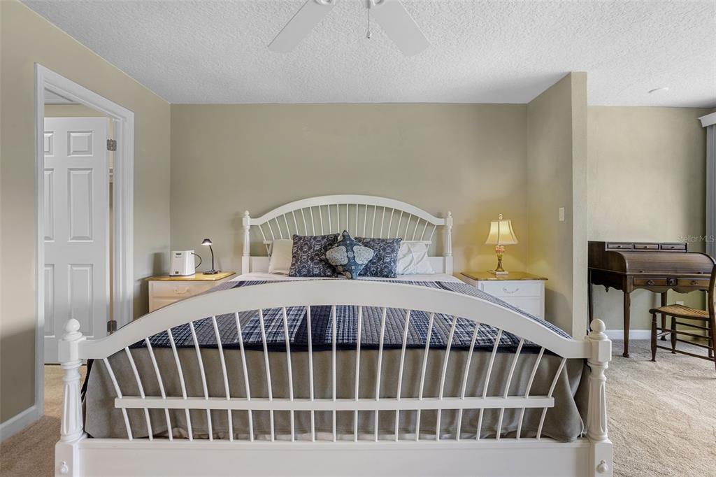 2329 River Ridge Road, Unit 15 DeLand, FL 32720 - Photo 13 of 40 a bedroom with furniture and a window