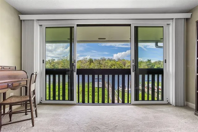 a view of a porch with a small yard