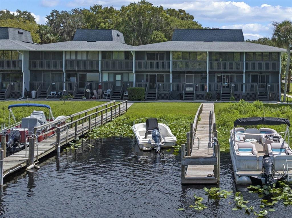 2329 River Ridge Road, Unit 15 DeLand, FL 32720 - Photo 2 of 40 a view of a house with a yard and sitting area