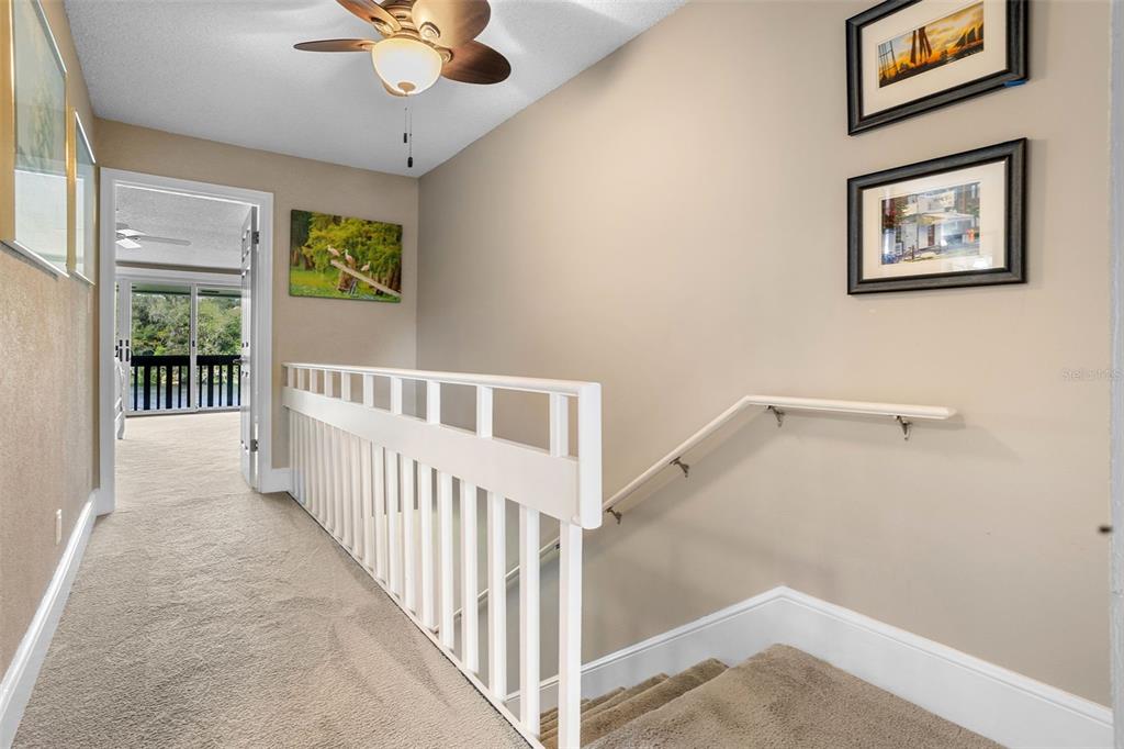 2329 River Ridge Road, Unit 15 DeLand, FL 32720 - Photo 22 of 40 a view of a hallway with workspace