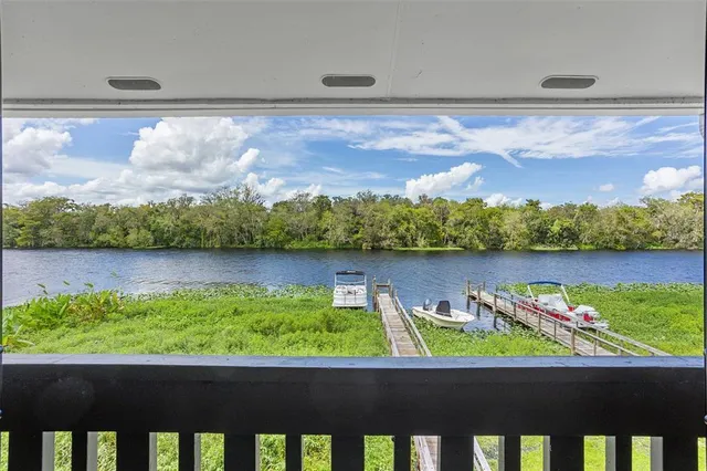 a view of a lake from a balcony