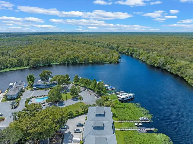 a view of a lake with a yard