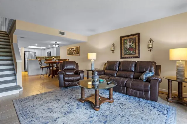 a living room with furniture and a couch