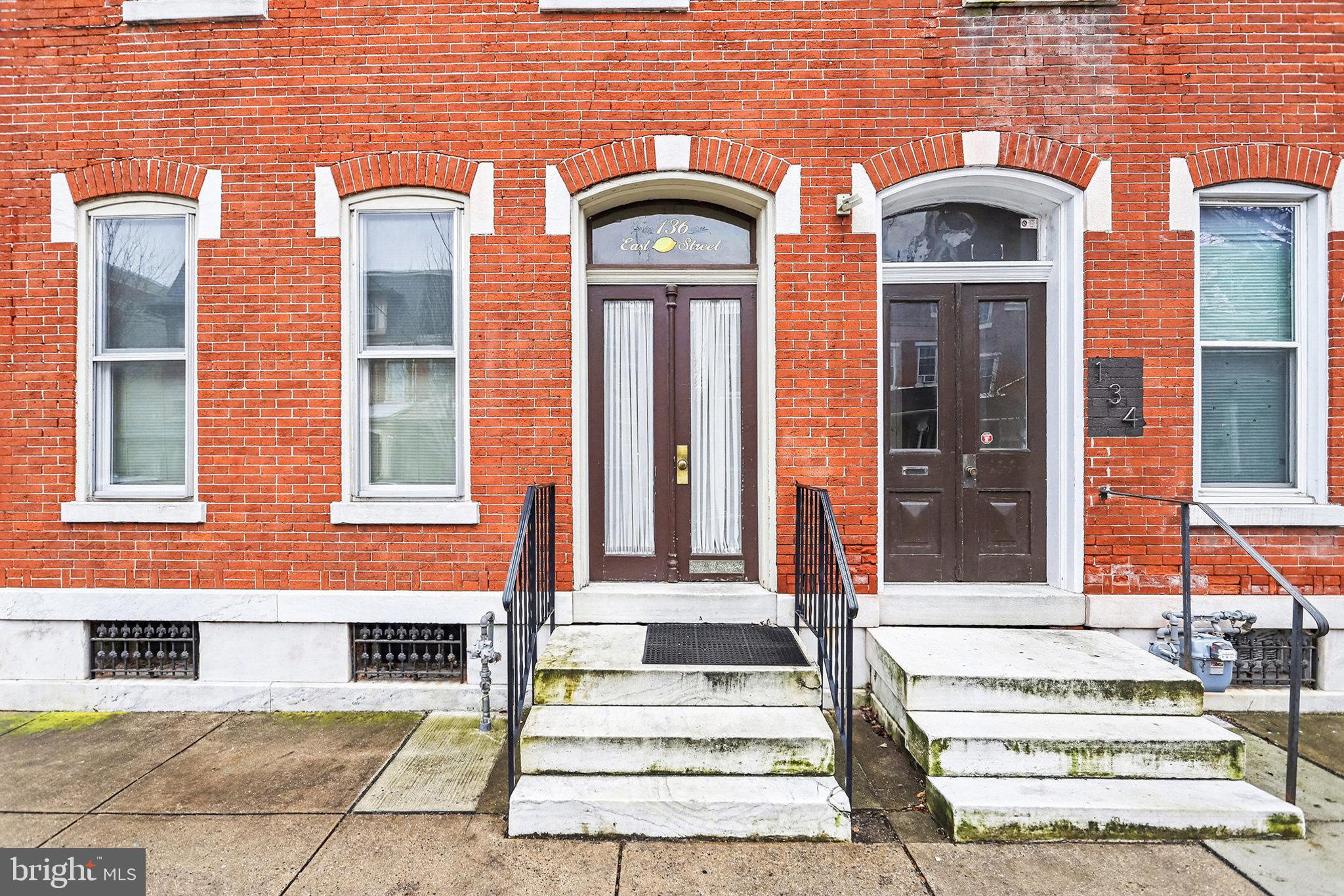 136 East Lemon Street, Unit 1 Lancaster, PA 17602 - Photo 2 of 16 Charming brick facade with inviting entrances.