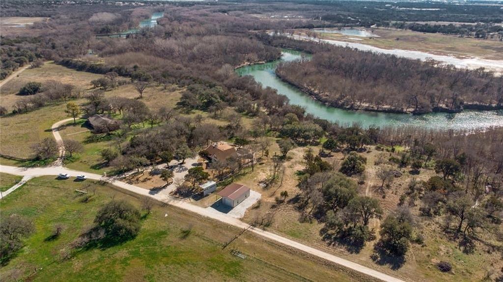 649 Wedgewood Drive China Spring, TX 76633 - Photo 37 of 39 Aerial view of property and surrounding area with a large body of water