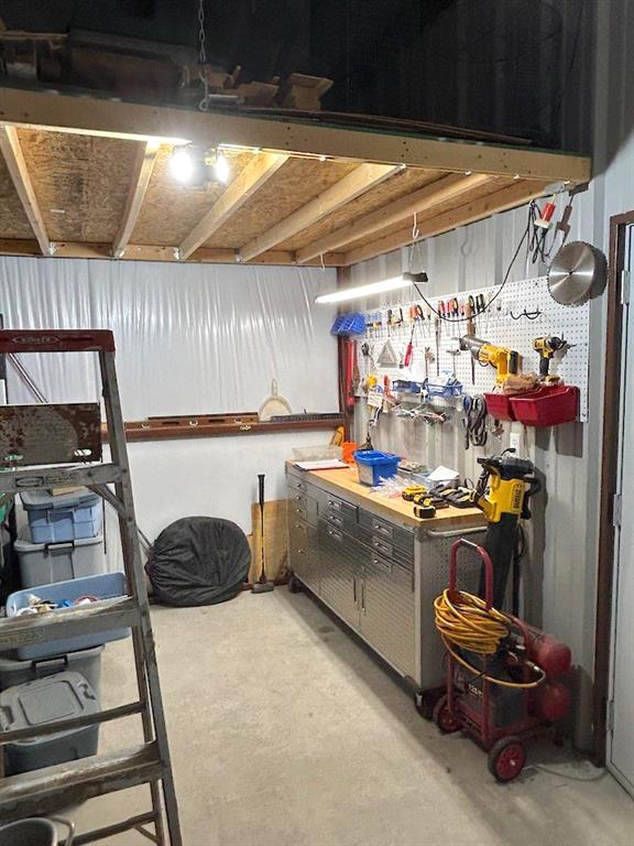 649 Wedgewood Drive China Spring, TX 76633 - Photo 39 of 39 Basement featuring a workshop area