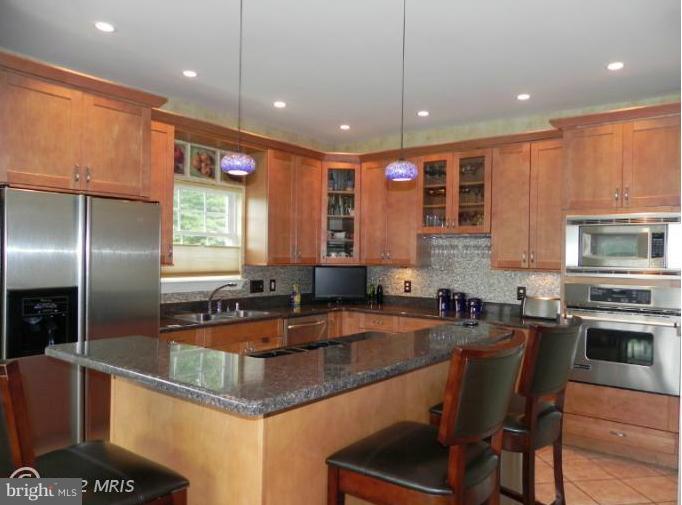318 Delight Meadows Road Reisterstown, MD 21136 - Photo 13 of 30 Granite counters & under + over cabinet lighting!