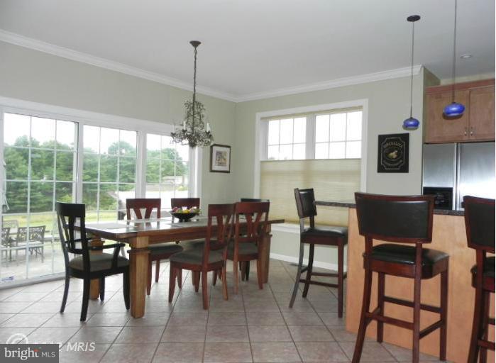 318 Delight Meadows Road Reisterstown, MD 21136 - Photo 15 of 30 Kitchen walks out to large rear yard & patio