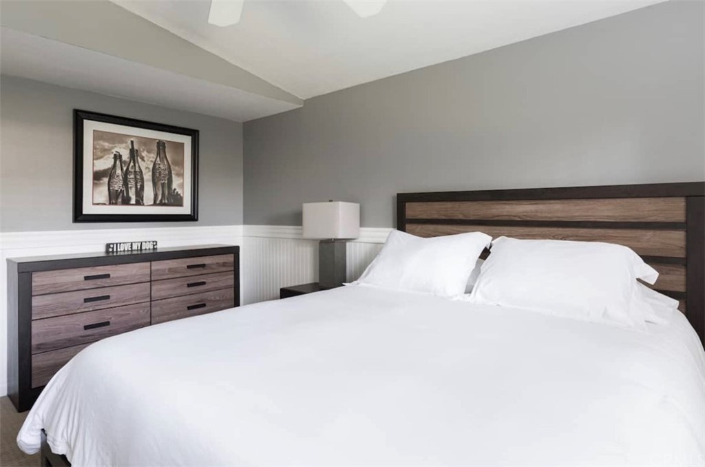 2378 Cornell Drive Costa Mesa, CA 92626 - Photo 13 of 40 a bedroom with a bed and a flat screen tv