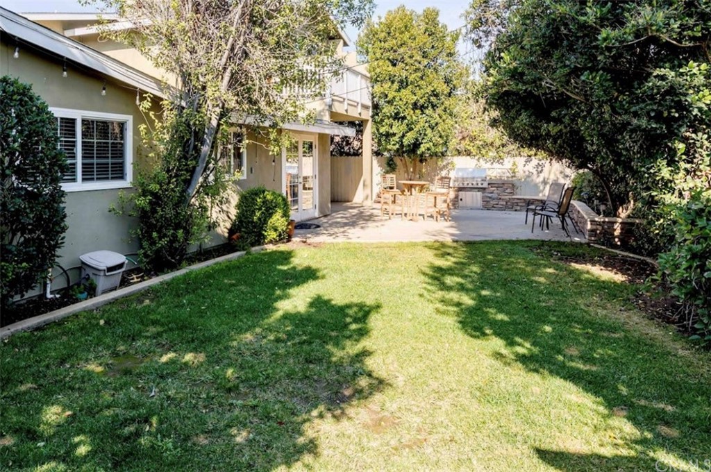 2378 Cornell Drive Costa Mesa, CA 92626 - Photo 21 of 40 a view of a house with a back yard