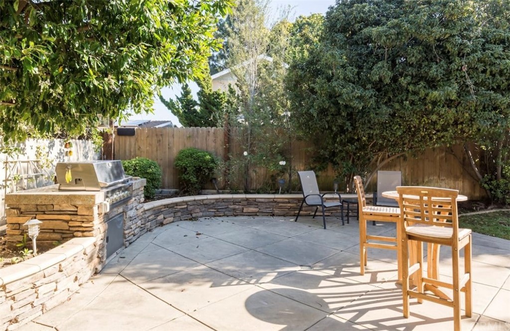 2378 Cornell Drive Costa Mesa, CA 92626 - Photo 23 of 40 a view of backyard with swimming pool and seating space