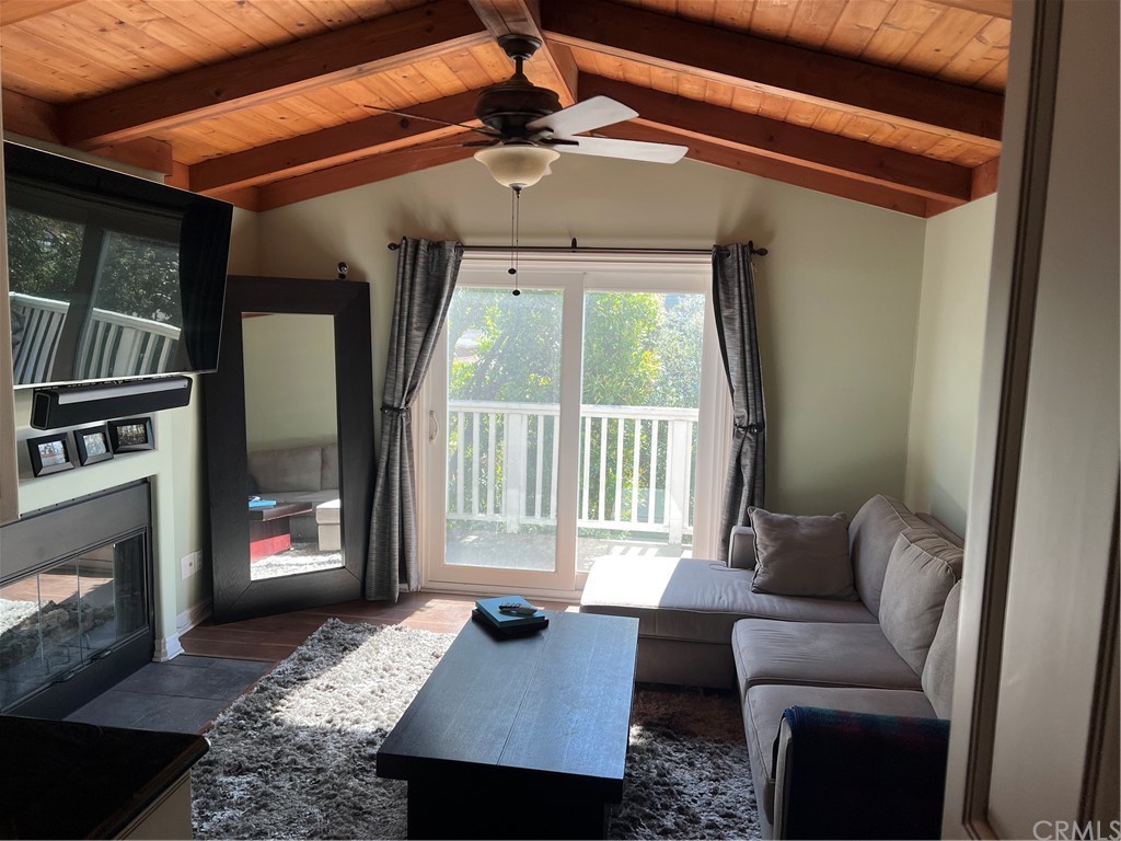 2378 Cornell Drive Costa Mesa, CA 92626 - Photo 29 of 40 a living room with furniture and a fireplace