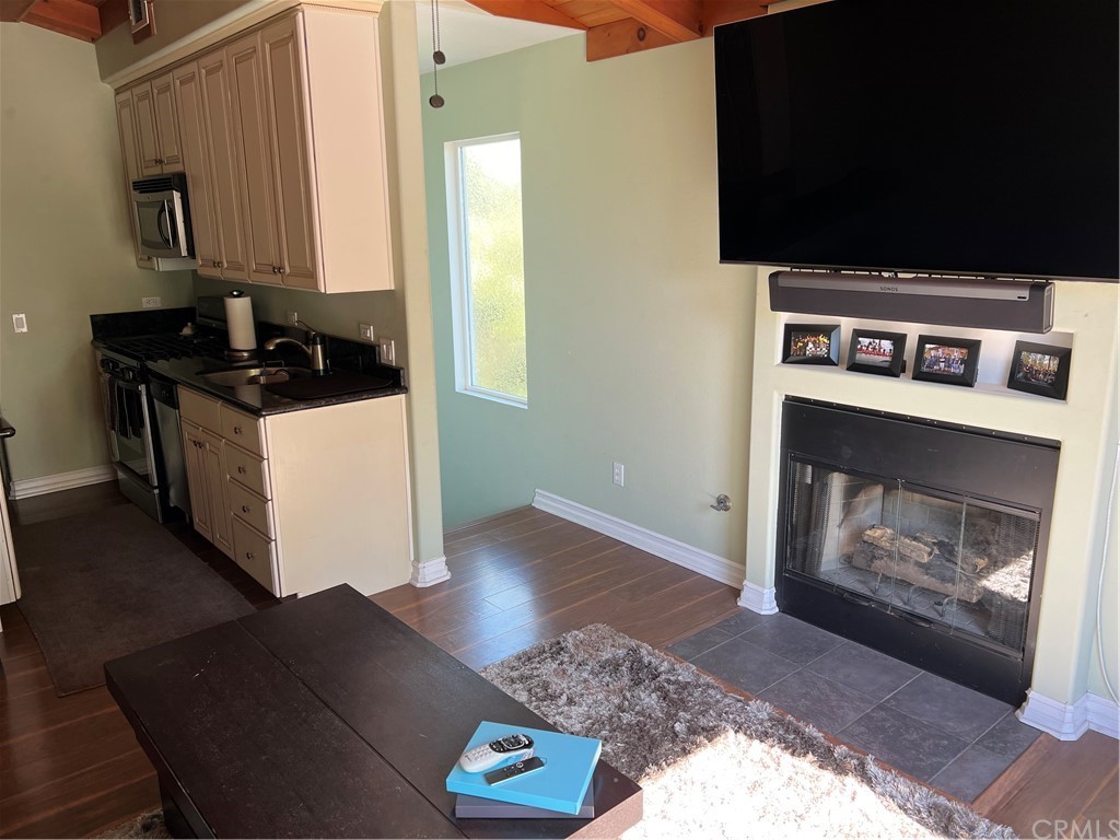 2378 Cornell Drive Costa Mesa, CA 92626 - Photo 31 of 40 a kitchen with a stove and a microwave