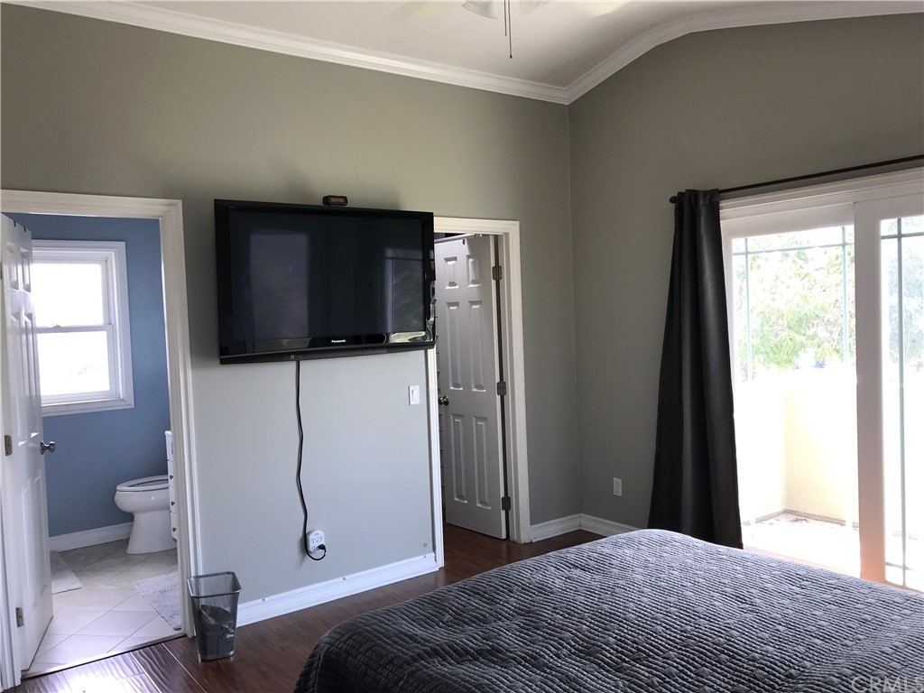 2378 Cornell Drive Costa Mesa, CA 92626 - Photo 37 of 40 a bedroom with a bed and a tv