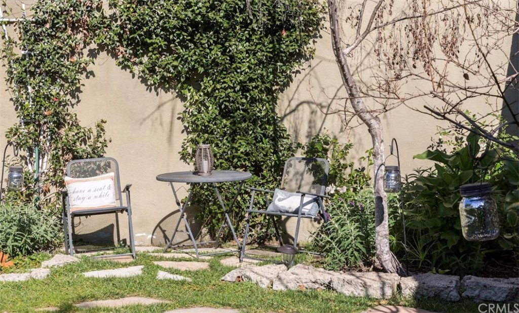 2378 Cornell Drive Costa Mesa, CA 92626 - Photo 4 of 40 a view of a chairs and table in the garden