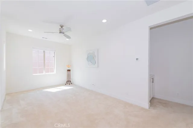 a bathroom with a bathtub shower and a sink