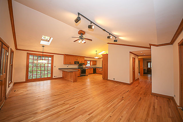 S436 Winfield Road Winfield, IL 60190 - Photo 13 of 23 a view of empty room with wooden floor and fan