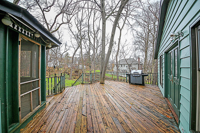 S436 Winfield Road Winfield, IL 60190 - Photo 4 of 23 a view of a balcony with wooden floor and fence