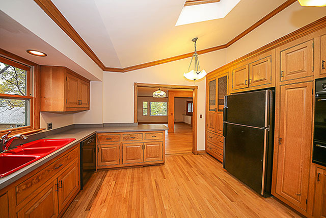 S436 Winfield Road Winfield, IL 60190 - Photo 10 of 23 a kitchen with stainless steel appliances a refrigerator and a sink