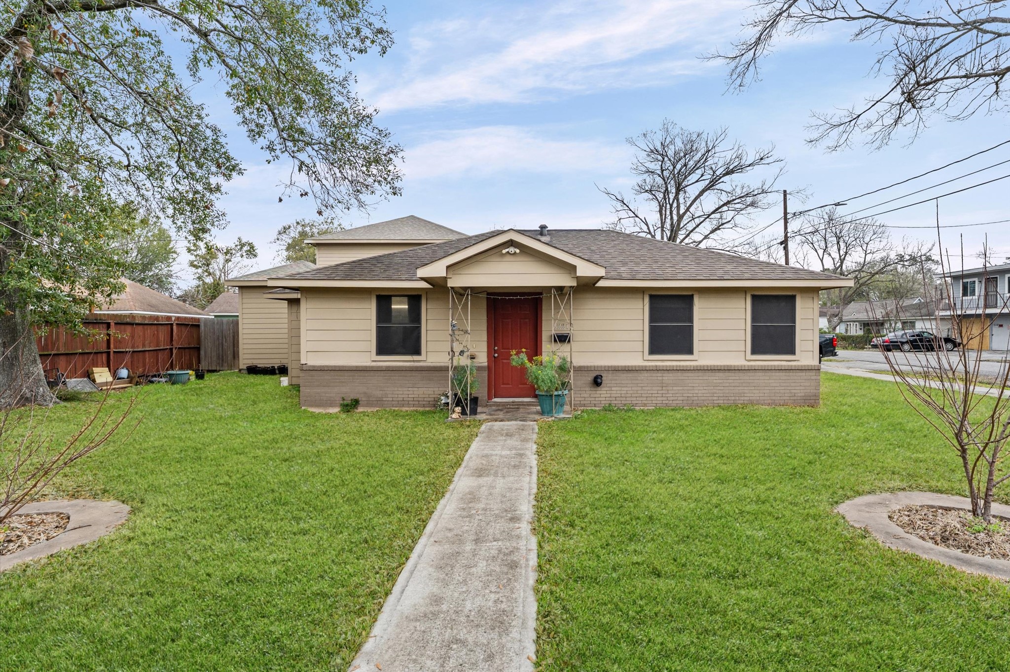8221 Brockton Street Houston, TX 77017 - Photo 1 of 32 a front view of a house with a garden