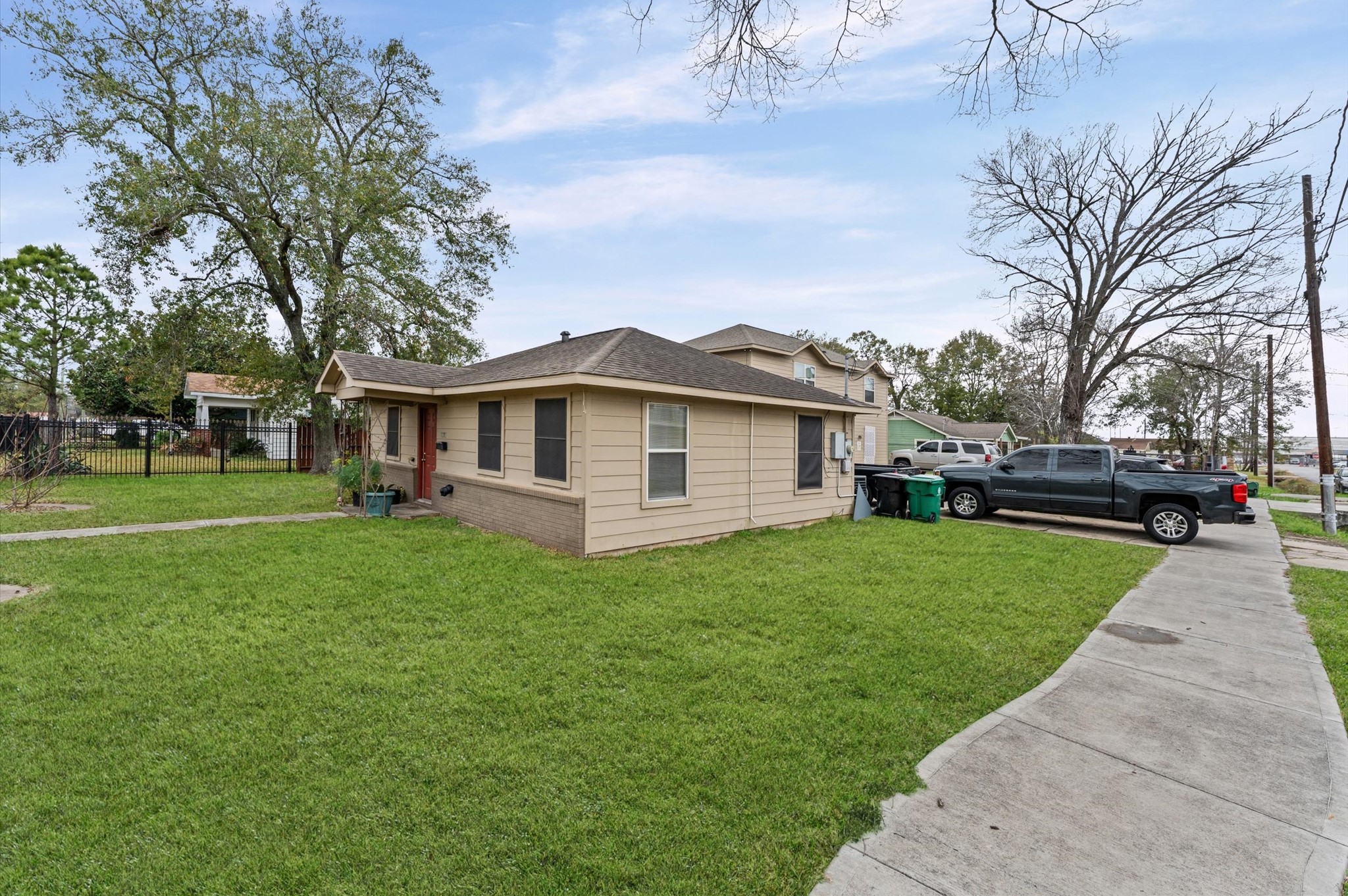 8221 Brockton Street Houston, TX 77017 - Photo 2 of 32 a view of a yard in front of the house