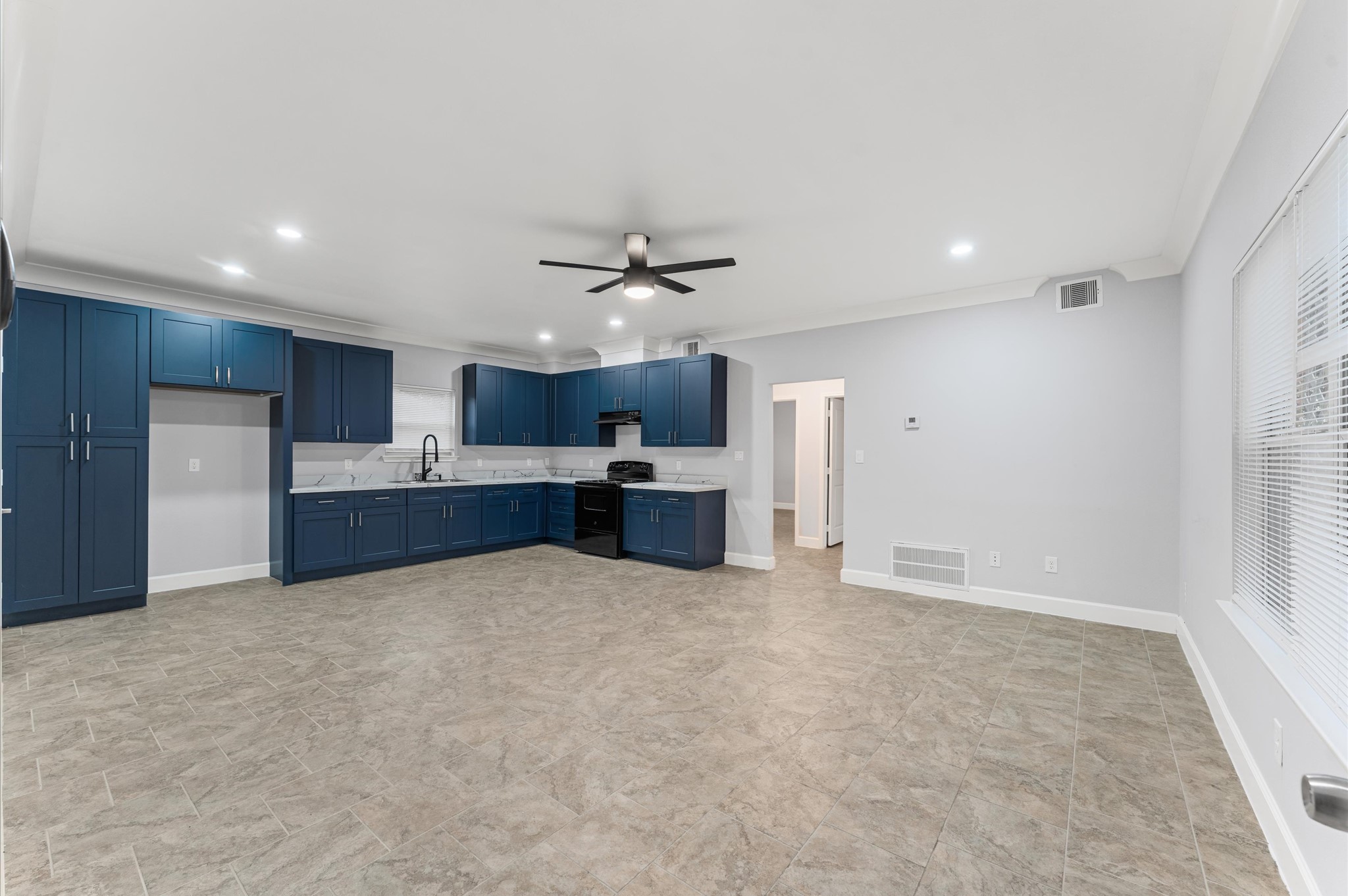 8221 Brockton Street Houston, TX 77017 - Photo 22 of 32 a view of a kitchen with a sink and a refrigerator