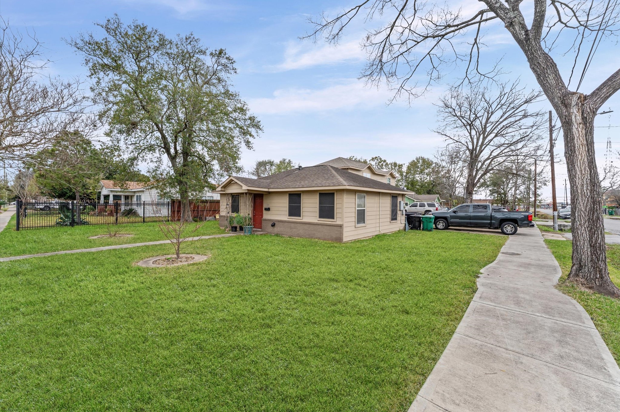 8221 Brockton Street Houston, TX 77017 - Photo 3 of 32 a view of a yard with a house in the background