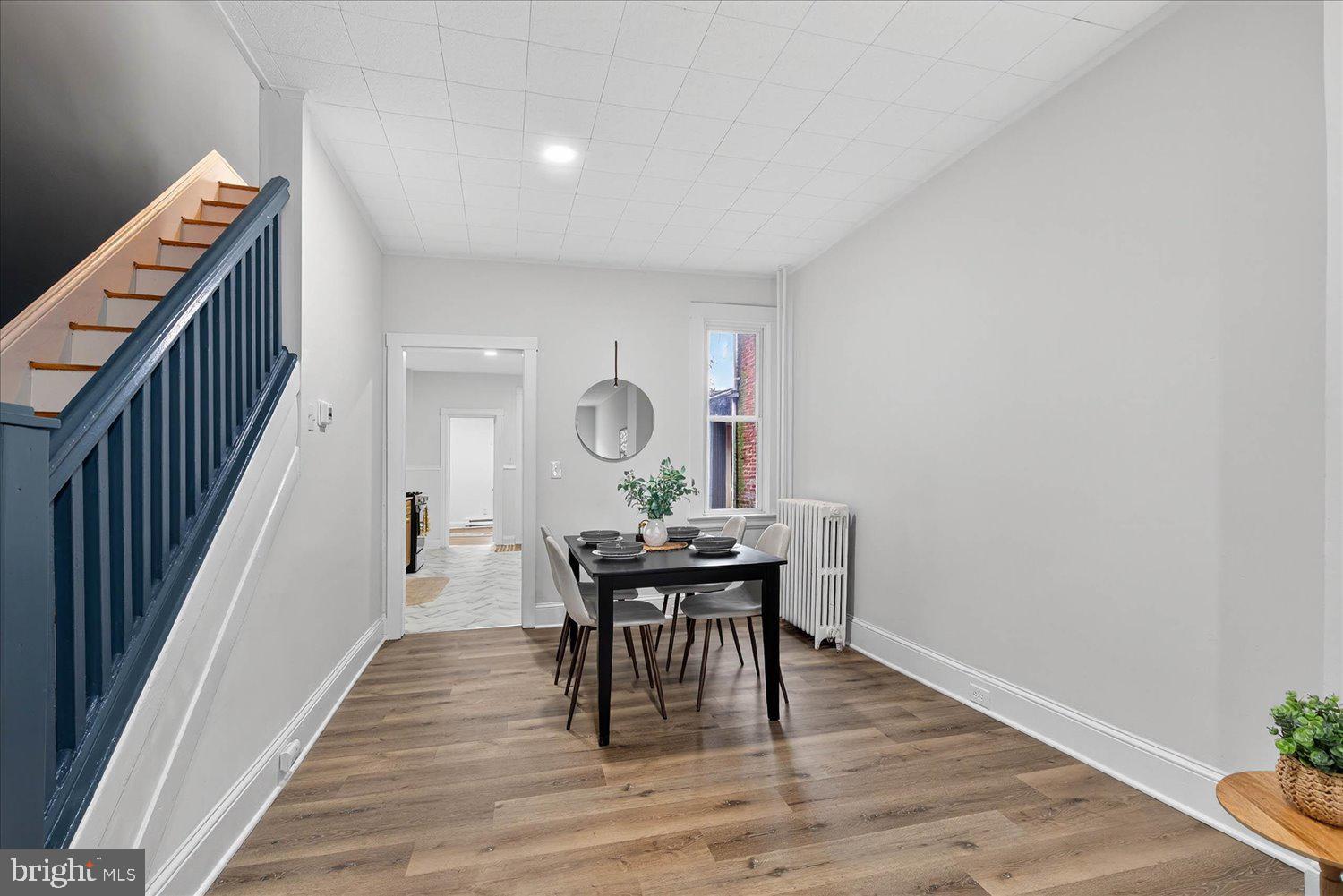 718 High Street Lancaster, PA 17603 - Photo 4 of 33 a view of a dining room with furniture and wooden floor