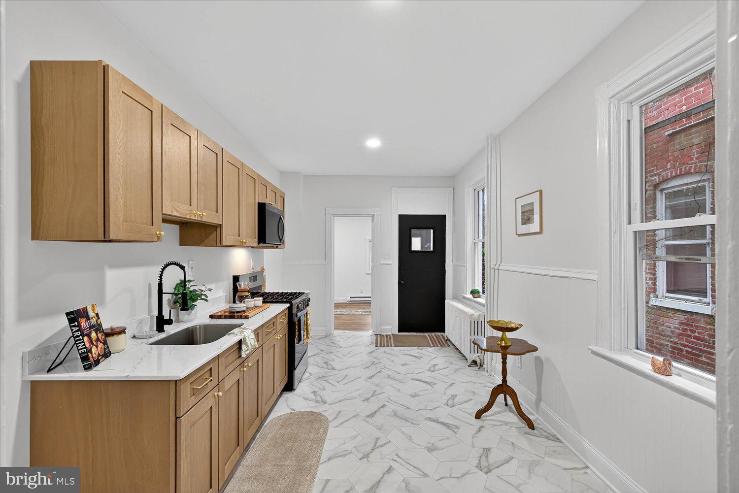 718 High Street Lancaster, PA 17603 - Photo 6 of 33 a kitchen with a sink and cabinets
