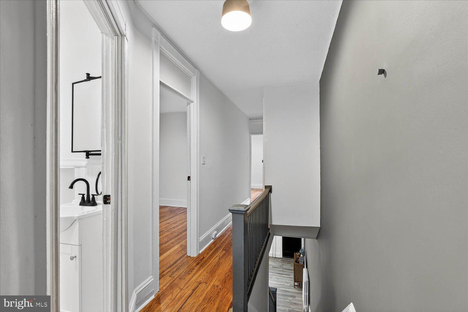 718 High Street Lancaster, PA 17603 - Photo 10 of 33 a view of a hallway with wooden floor and staircase