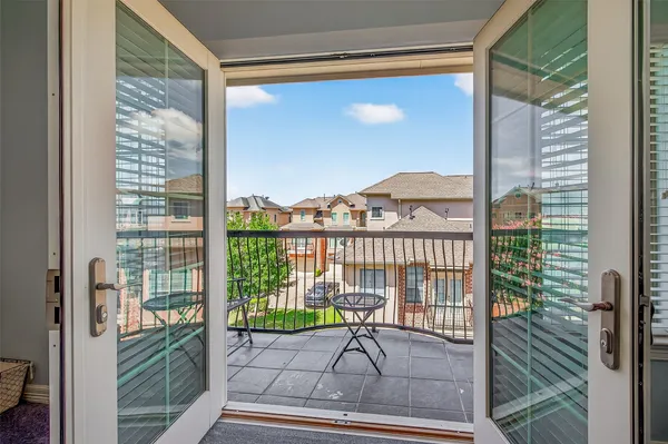 a view of a city from a balcony