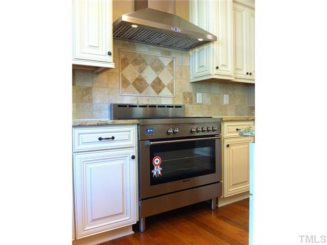 5308 Sinesis Court Raleigh, NC 27609 - Photo 8 of 25 36 inch Stainless Commercial Gas Range + Hood Kitchen