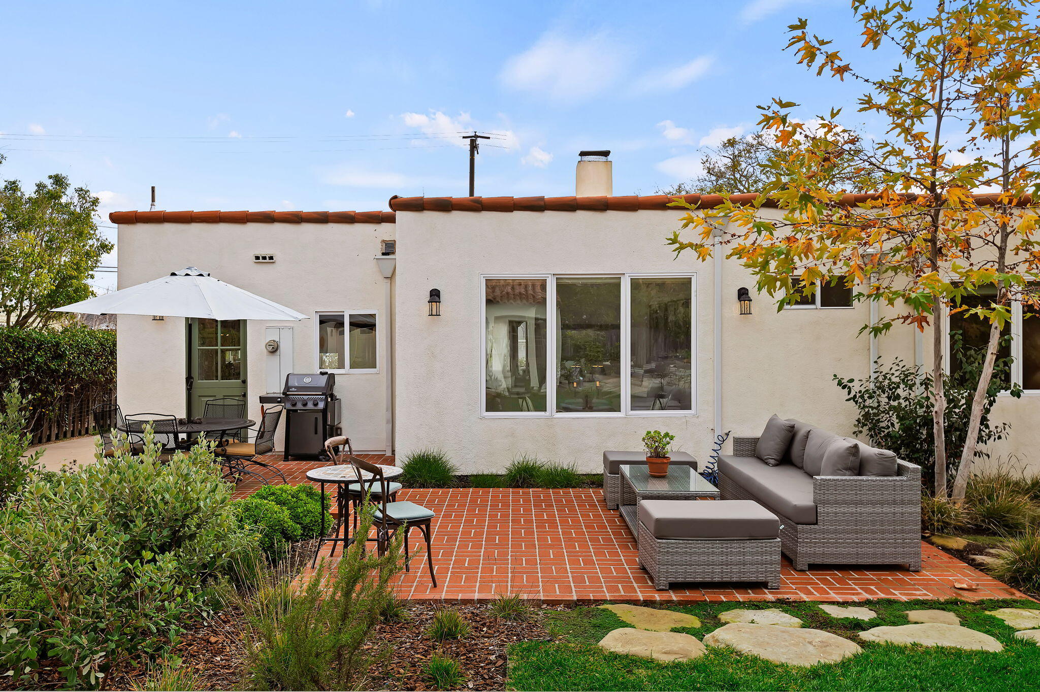 3020 Puesta Del Sol Santa Barbara, CA 93105 - Photo 32 of 33 a view of a patio with couches table and chairs and potted plants