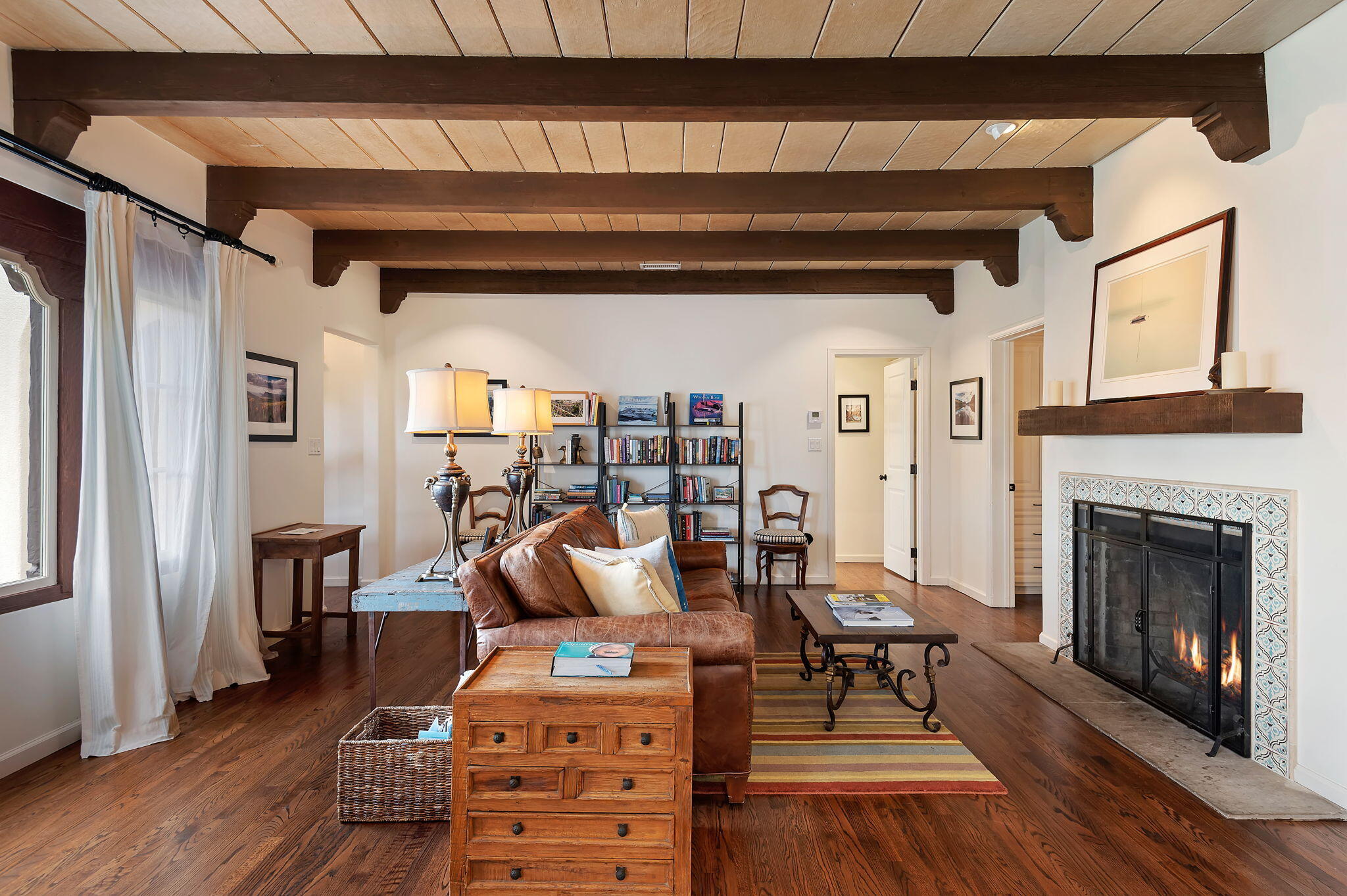 3020 Puesta Del Sol Santa Barbara, CA 93105 - Photo 4 of 33 a living room with furniture and a fireplace