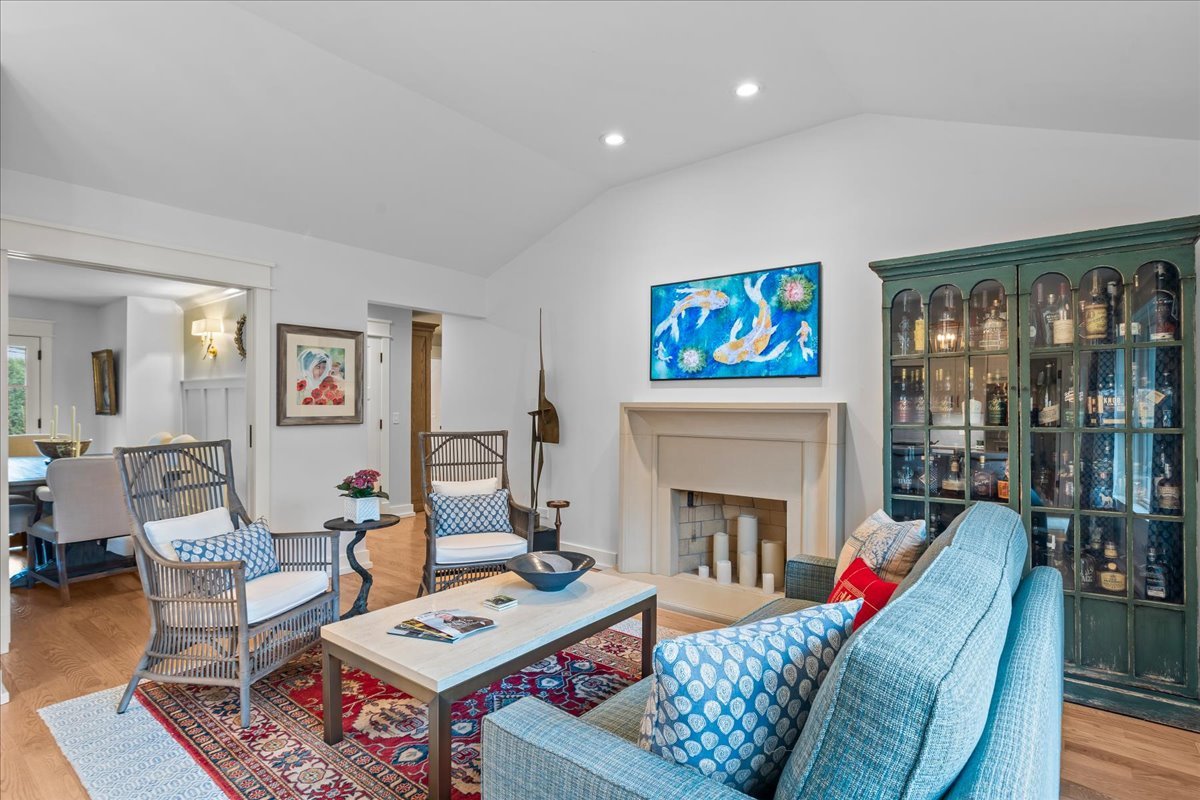 140 West Old Elm Road Lake Forest, IL 60045 - Photo 19 of 38 a living room with furniture a rug and a fireplace