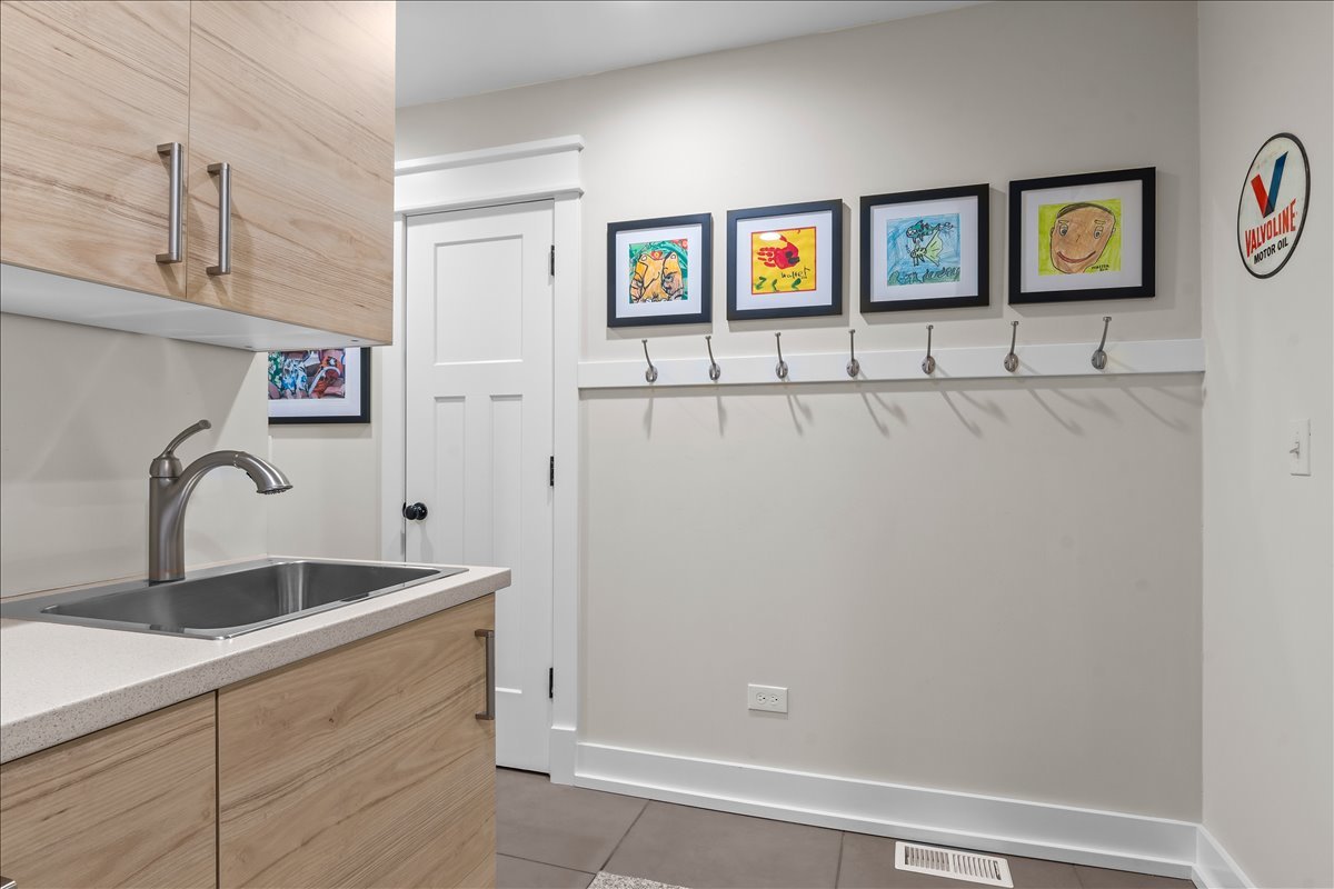 140 West Old Elm Road Lake Forest, IL 60045 - Photo 22 of 38 a view of a refrigerator in a kitchen