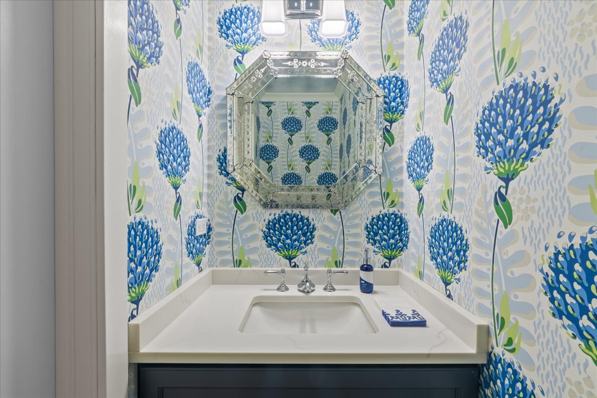 140 West Old Elm Road Lake Forest, IL 60045 - Photo 23 of 38 a bathroom with a sink and a mirror
