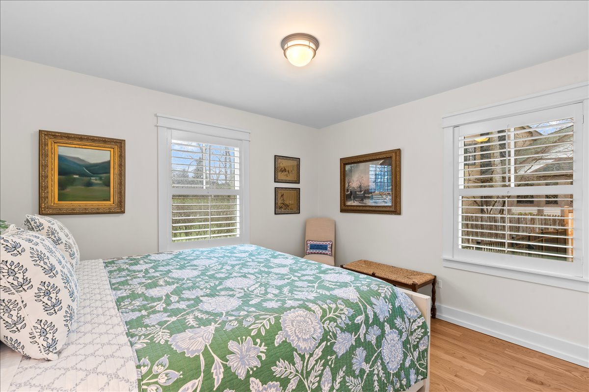 140 West Old Elm Road Lake Forest, IL 60045 - Photo 30 of 38 a bedroom with a bed and a window