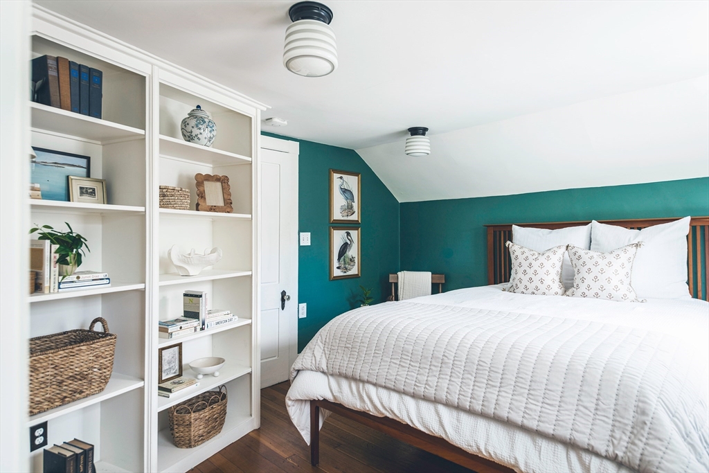 30 Paradise Road Swampscott, MA 01907 - Photo 14 of 24 a bedroom with a bed cabinets and window