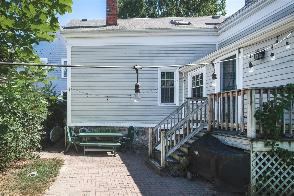 30 Paradise Road Swampscott, MA 01907 - Photo 22 of 24 a view of a house with a small deck and wooden floor