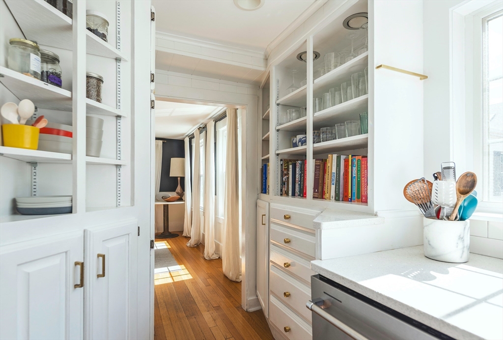 30 Paradise Road Swampscott, MA 01907 - Photo 5 of 24 a kitchen with a stove and a wooden floor