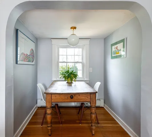 a view of a workspace with furniture
