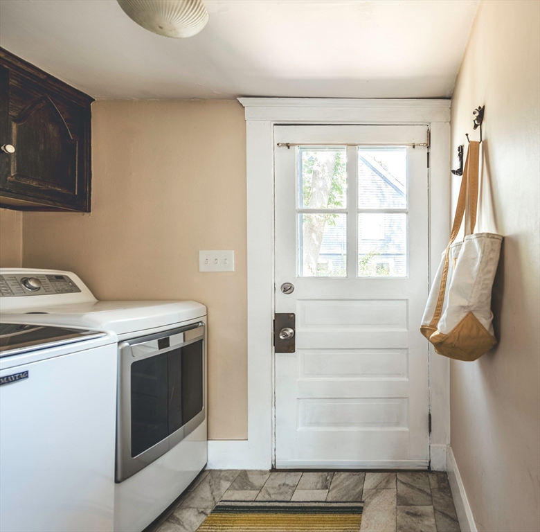30 Paradise Road Swampscott, MA 01907 - Photo 9 of 24 a utility room with dryer and washer