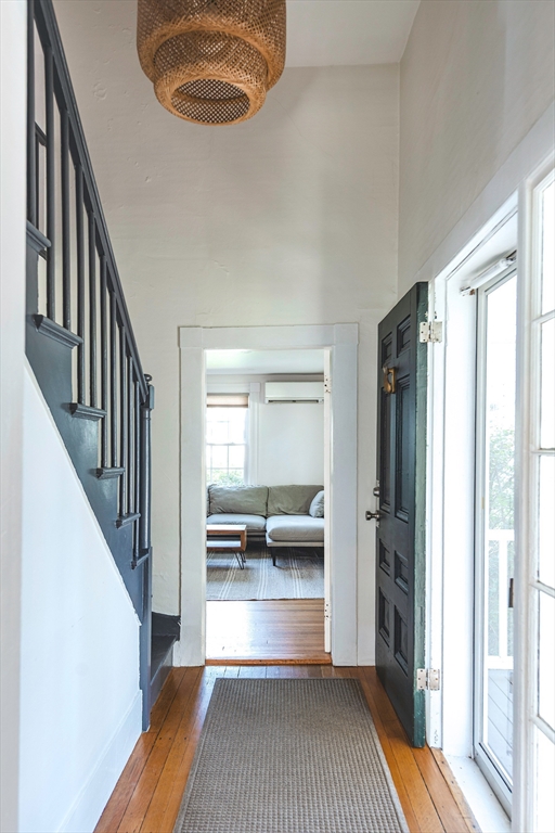 30 Paradise Road Swampscott, MA 01907 - Photo 10 of 24 a view of a hallway with wooden floor and staircase