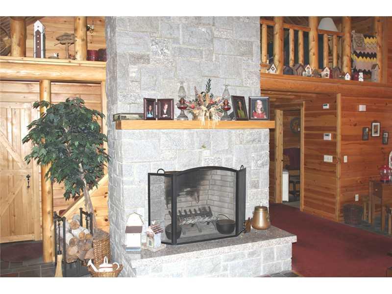 935 Brighton Road Athens, ME 04912 - Photo 13 of 24 Living Room. Granite fireplace
