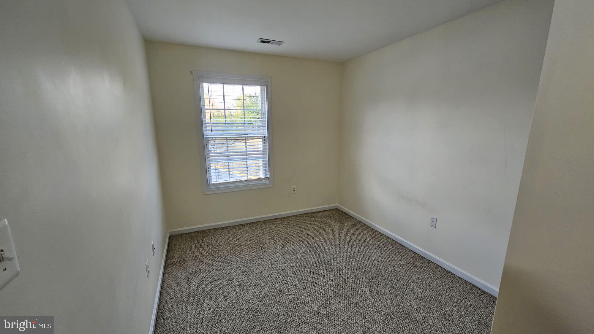 201 Eastside Lane Winchester, VA 22602 - Photo 16 of 21 an empty room with a window