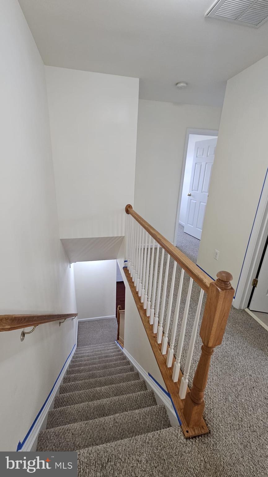 201 Eastside Lane Winchester, VA 22602 - Photo 21 of 21 a view of a hallway with staircase