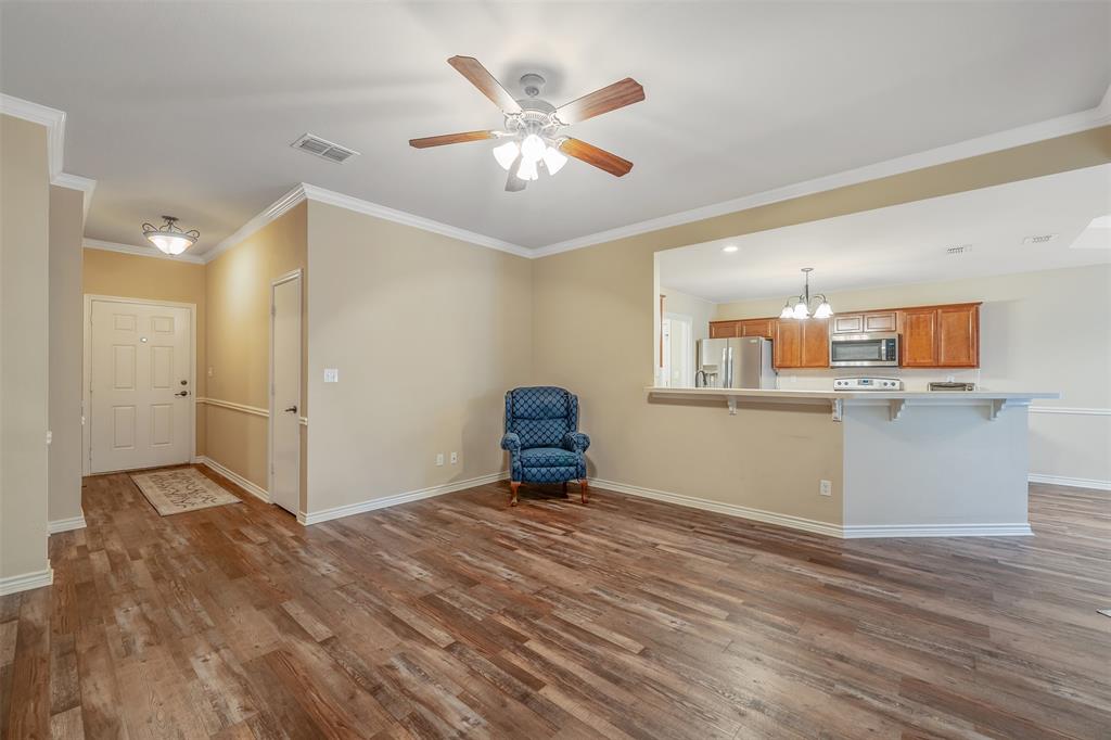 421 West Cumberland Road, Unit 205 Tyler, TX 75703 - Photo 6 of 24 a view of a kitchen with a sink and cabinet area