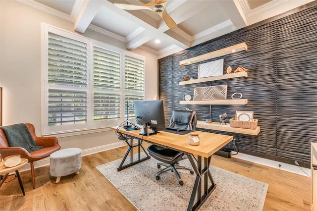 a workspace with furniture and a window