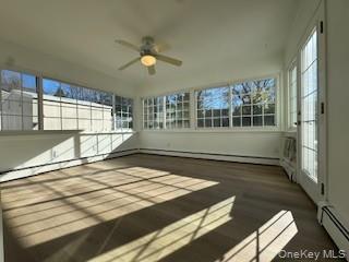 29 Arizona Avenue Syosset, NY 11791 - Photo 19 of 26 a view of wooden floor and windows in a room